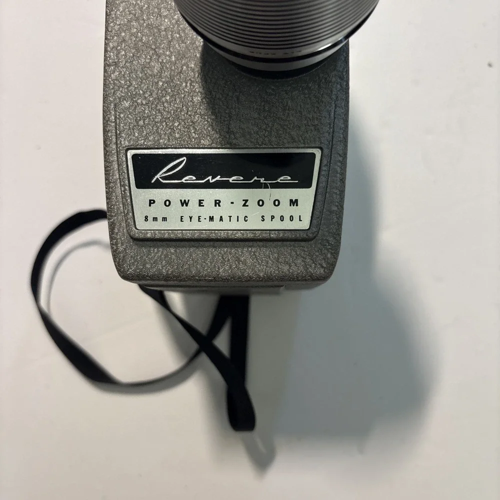 The Revere Model 118D Eye Matic 8mm Movie Camera Power Zoom Telephoto Wide Angle